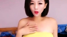 Super Hot Asian With Big Boobs Stripping And Masturbating