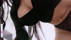 Big boobed Memphis masturbates in a bodystocking