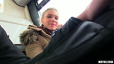 Beautiful blonde with an attractive smile gets picked up in a bus