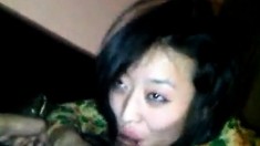 Vietnamese GF sucking on a small penis